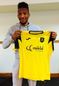 Myles Hippolyte with this season's home shirt